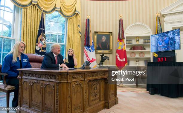 President Donald Trump speaks along with his daughter Ivanka Trump and NASA Astronaut Kate Rubins, during a video conference with NASA astronauts...