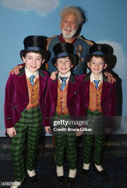 John Rubenstein as "Grandpa Joe" poses with the 3 "Charlies" Jake Ryan Flynn, Ryan Foust and Ryan Sell backstage on opening night of the new musical...