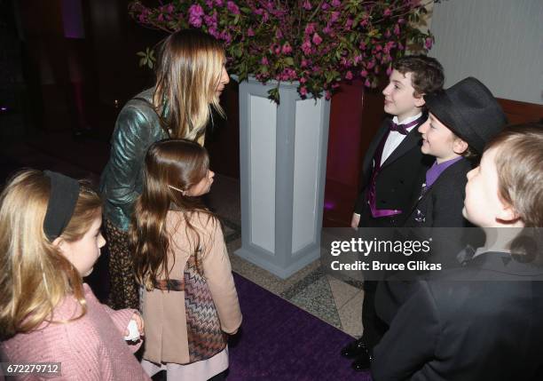 Sarah Jessica Parker and daughters Tabitha Broderick and Marion Broderick pose with the 3 "Charlies" Jake Ryan Flynn, Ryan Foust and Ryan Sell at the...