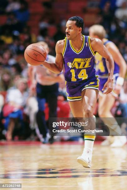 Rickey Green of the Utah Jazz dribbles against the Atlanta Hawks during a game played circa 1990 at the Omni in Atlanta, Georgia. NOTE TO USER: User...