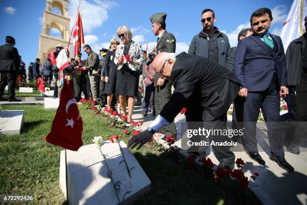 Turkish Culture and Tourism Minister Nabi Avci lays flowers to martyrs' cemetery during the ceremony marking the 102nd anniversary of the Canakkale...