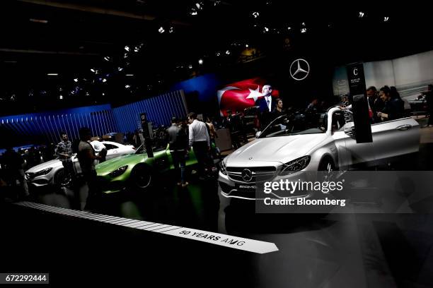 Display of AMG supercars sit on a display to mark 50 years of AMG, a division of Mercedes-Benz AG, at the Istanbul Autoshow in Buyukcekmece, Turkey,...