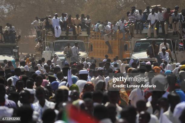 Thousands of Darfurians attend a rally as Sudanese President Omar Al Bashir speaks in El Fasher in North Darfur , Sudan, March 8, 2009. Bashir...