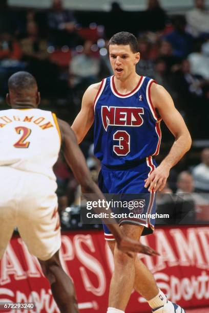 Drazen Petrovic of the New Jersey Nets dribbles against the Atlanta Hawks during a game played circa 1990 at the Omni in Atlanta, Georgia. NOTE TO...