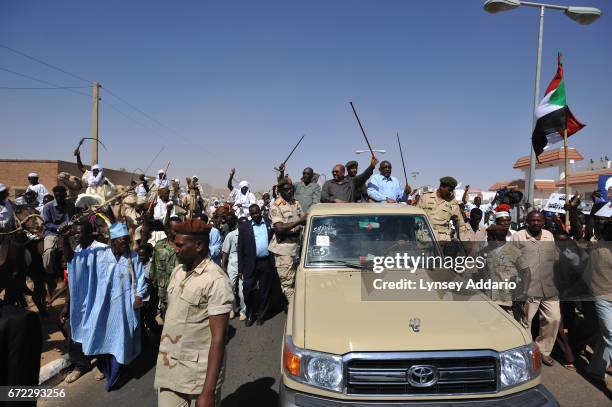 Sudanese President Omar Al Bashir parades through the streets of El Fasher in North Darfur before holding a rally in El Fasher, Sudan, March 8, 2009....