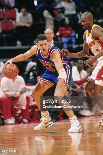 Drazen Petrovic of the New Jersey Nets dribbles against the Atlanta Hawks during a game played circa 1990 at the Omni in Atlanta, Georgia. NOTE TO...