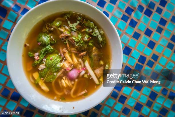 a bowl of asam or penang laksa - george town penang stock pictures, royalty-free photos & images