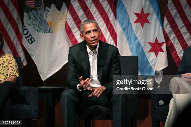 Former U.S. President Barack Obama visits with youth leaders at the University of Chicago to help promote community organizing on April 24, 2017 in...