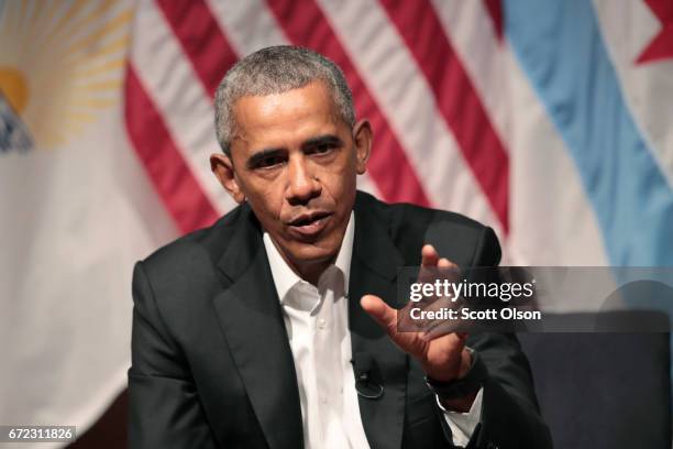 Former U.S. President Barack Obama visits with youth leaders at the University of Chicago to help promote community organizing on April 24, 2017 in...