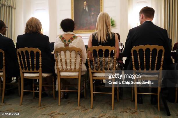 Ivanka Trump, daughter of U.S. President Donald Trump , listens to her father deliver remarks while hosting ambassadors from the 15 country members...