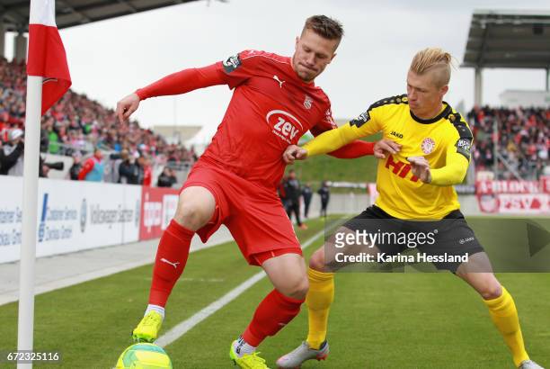 Patrick Wolf of Zwickau challenges Michael Kessel of Koeln during the Third League match between FSV Zwickau and Fortuna Koeln on April 23, 2017 at...