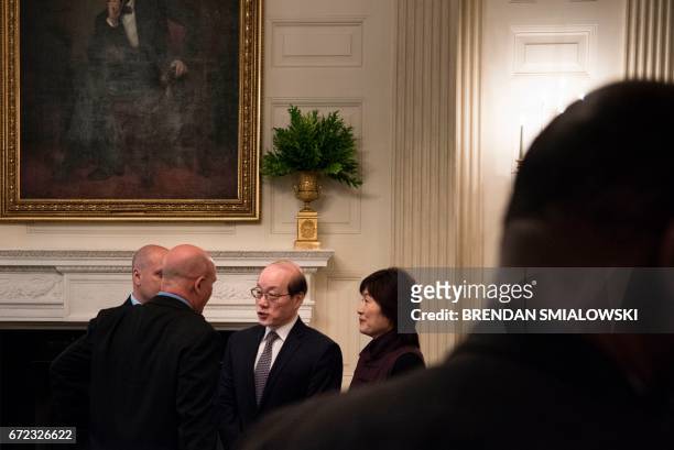 National Security Advisor HR McMaster and China's Ambassador to the UN Liu Jieyi speak before a working lunch with US President Donald Trump and UN...