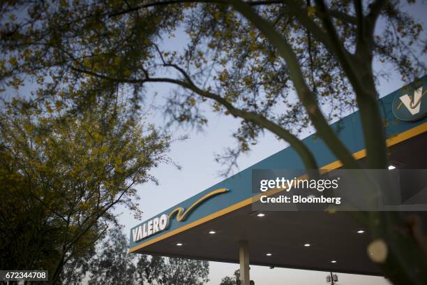 Signage is displayed at a Valero Energy Corp. Gas station in Phoenix, Arizona, U.S., on Saturday, April 22, 2017. Valero is scheduled to release...