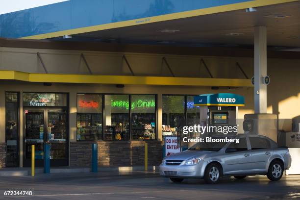 Vehicle refuels at a Valero Energy Corp. Gas station in Phoenix, Arizona, U.S., on Saturday, April 22, 2017. Valero is scheduled to release earnings...