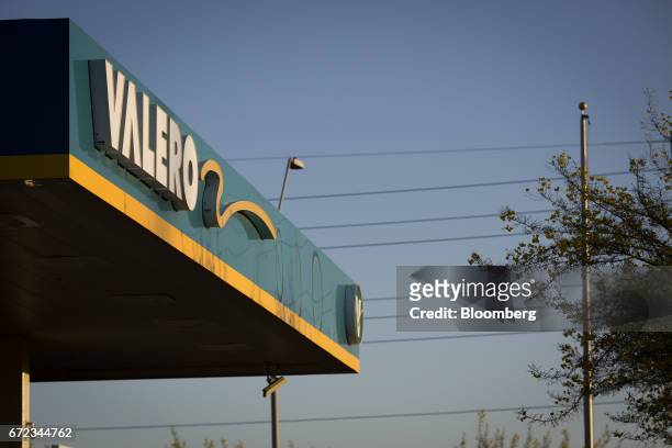 Signage is displayed at a Valero Energy Corp. Gas station in Phoenix, Arizona, U.S., on Saturday, April 22, 2017. Valero is scheduled to release...