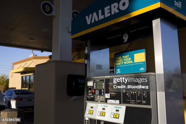 Valero Energy Corp. Fuel pump stands at the company's gas station in Phoenix, Arizona, U.S., on Saturday, April 22, 2017. Valero is scheduled to...