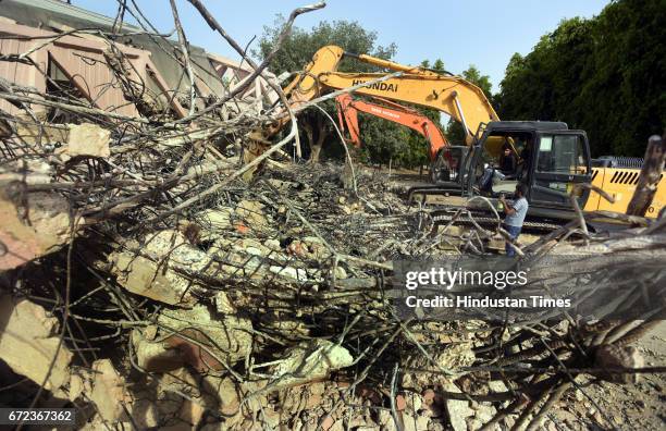 Workers demolish the Hall of Industries at Pragati Maidan, designed by architect Raj Rewal and engineer Mahendra Raj, at Pragati Maidan on April 24,...