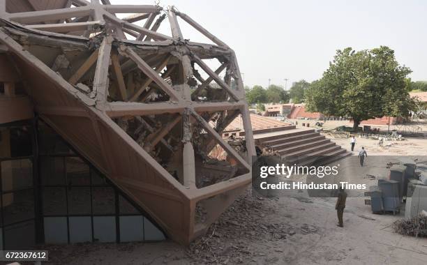 Workers demolish the Hall of Industries at Pragati Maidan, designed by architect Raj Rewal and engineer Mahendra Raj, at Pragati Maidan on April 24,...