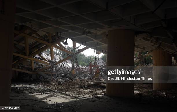 Workers demolish the Hall of Industries at Pragati Maidan, designed by architect Raj Rewal and engineer Mahendra Raj, at Pragati Maidan on April 24,...