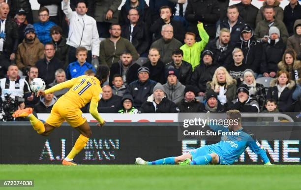 Rob Elliot of Newcastle United makes a save from Daniel Johnson of Preston North End during the Sky Bet Championship match between Newcastle United...