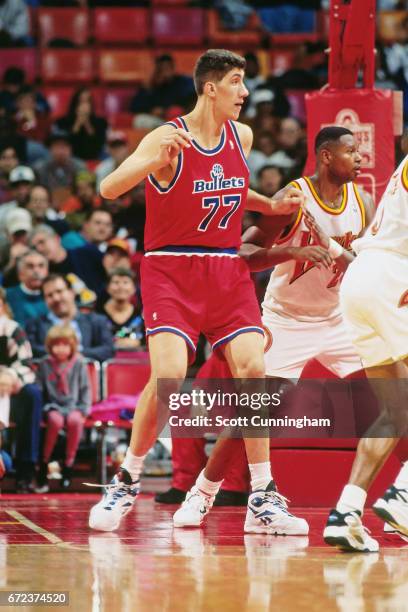 Gheorghe Muresan of the Washington Bullets posts up against the Atlanta Hawks during a game played circa 1990 at the Omni in Atlanta, Georgia. NOTE...