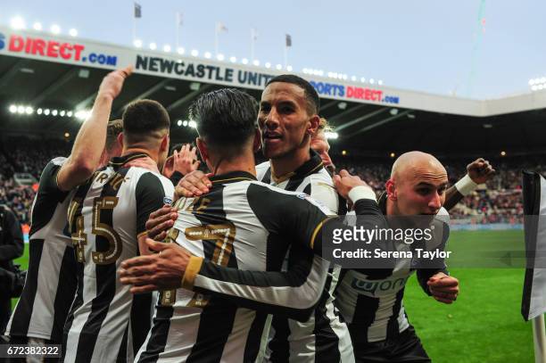 Ayoze Perez of Newcastle United celebrates with teammates after he scores the opening goal during the Sky Bet Championship match between Newcastle...