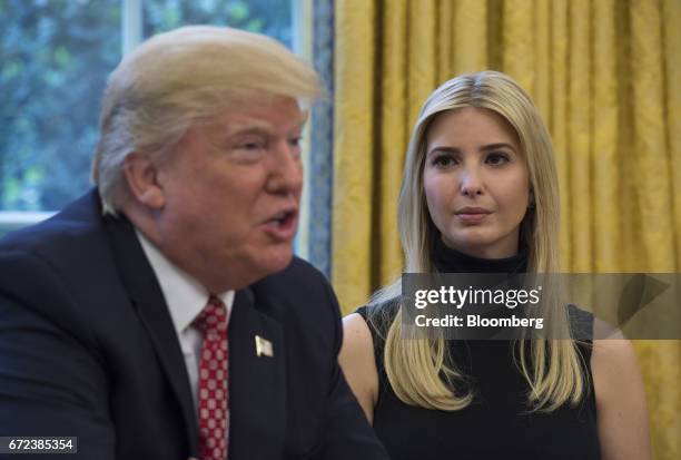 Ivanka Trump listens as her father U.S. President Donald Trump speaks while holding a video conference to the International Space Station with NASA...