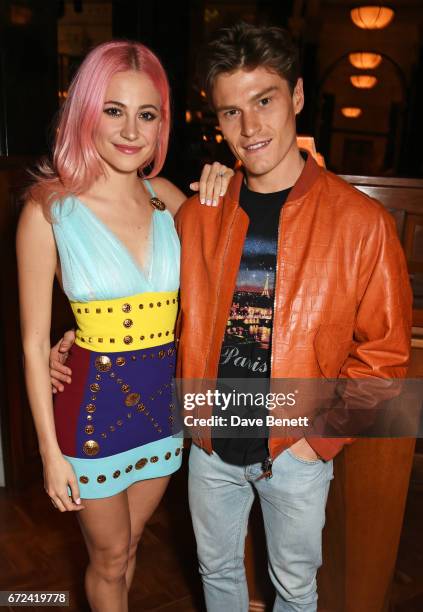 Pixie Lott and Oliver Cheshire attend a pre-opening dinner hosted by Ed Drewett at Malibu Kitchen, at The Ned, London on April 24, 2017 in London,...