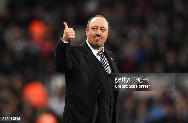 Rafa Benitez manager of Newcastle United gives a thumbs up as he celebrates victory and promotion after the Sky Bet Championship match between...