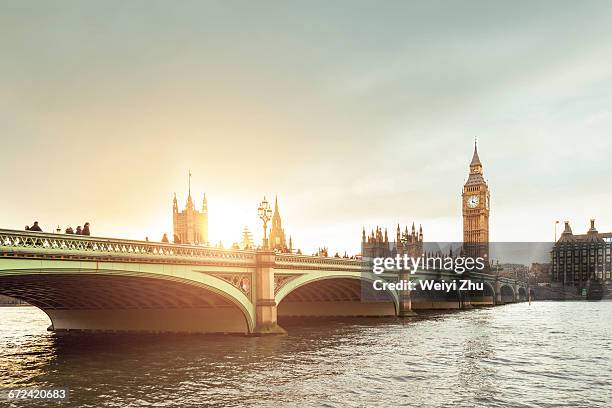 houses of parliament at sunset in london - westminster bridge stock pictures, royalty-free photos & images