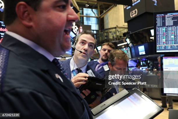 Traders work on the floor of the New York Stock Exchange on April 24, 2017 in New York City. As investors cheered the results of the first round in...