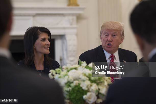 President Donald Trump, right, and Nikki Haley, U.S. Ambassador to the United Nations , host a working lunch with members of the UN Security Council...