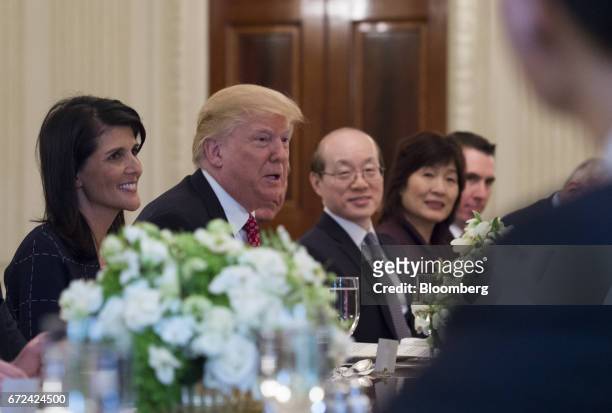 President Donald Trump, second left, and Nikki Haley, U.S. Ambassador to the United Nations , left, host a working lunch with members of the UN...
