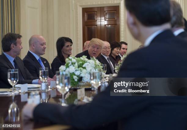 President Donald Trump, center, and Nikki Haley, U.S. Ambassador to the United Nations , third left, host a working lunch with members of the UN...