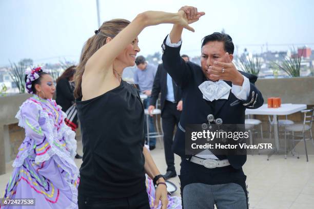 Klara Bierhoff dances with mexican folkloric dancers during the visit and unveiling of plaque for the economic support given by the DFB Egidius Braun...