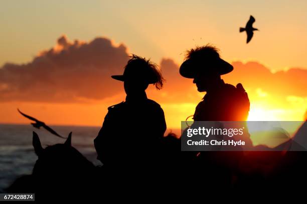 Members of the Mudgeeraba light horse troop take part in the ANZAC dawn service at Currumbin Surf Life Saving Club on April 25, 2017 in Currumbin,...