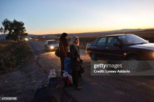 Syrian refugees cross into Turkey after the Muslim Holiday of Eid al-Adha through unofficial border crossings in villages around Reyhanli and...