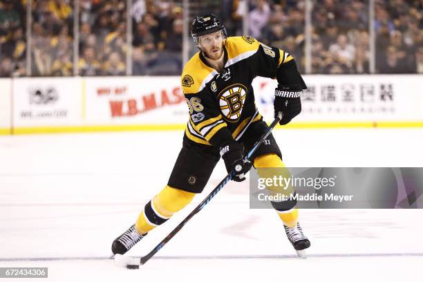 Kevan Miller of the Boston Bruins skates against the Ottawa Senators during the third period of Game Six of the Eastern Conference First Round during...