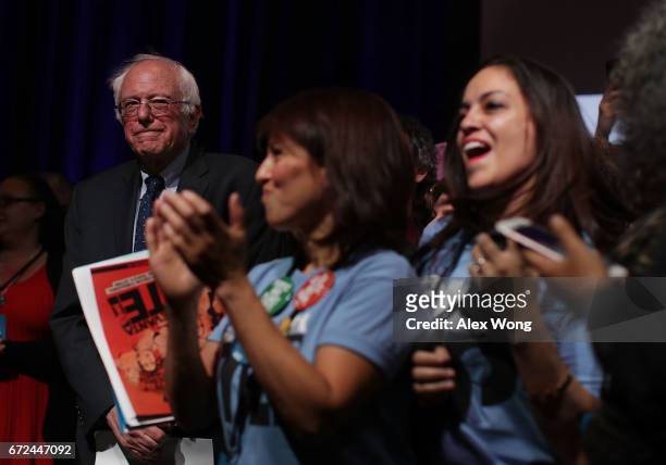 Sen. Bernie Sanders waits to be introduced during the "Rise Up: From Protest to Power" convention April 24, 2017 in Washington, DC. Activists...