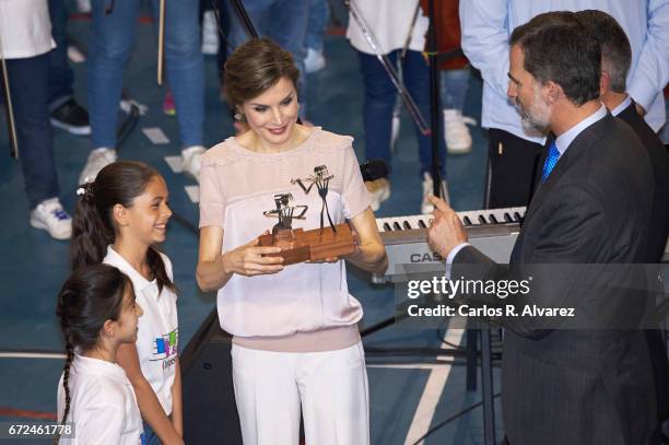 King Felipe VI of Spain and Queen Letizia of Spain attend the presentation of the 'Orchestrated Neighborhoods' at the El Batan stadium on April 24,...