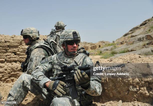 Lt. Gen. John W. Nicholson Jr., the Deputy Commander of all forces in Southern Afghanistan at the time, holds a position during a Taliban ambush...