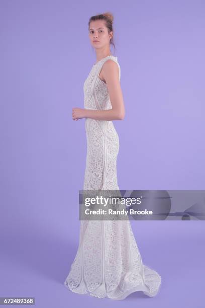 Model poses on seamless paper at the Isabelle Armstrong Spring 2018 bridal presentation during New York Fashion Week: Bridal April 2017 at The London...