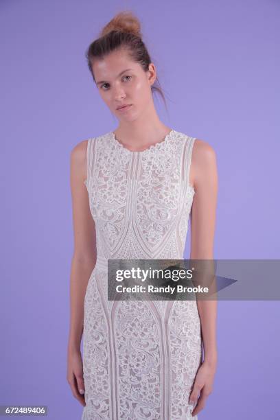 Model poses on seamless paper at the Isabelle Armstrong Spring 2018 bridal presentation during New York Fashion Week: Bridal April 2017 at The London...