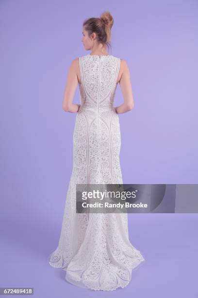 Model poses on seamless paper at the Isabelle Armstrong Spring 2018 bridal presentation during New York Fashion Week: Bridal April 2017 at The London...