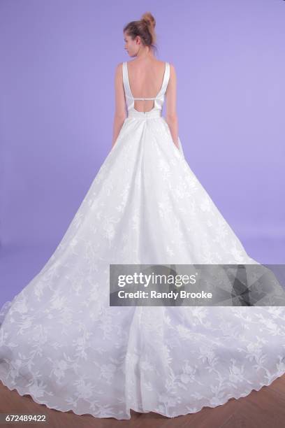 Model poses on seamless paper at the Isabelle Armstrong Spring 2018 bridal presentation during New York Fashion Week: Bridal April 2017 at The London...