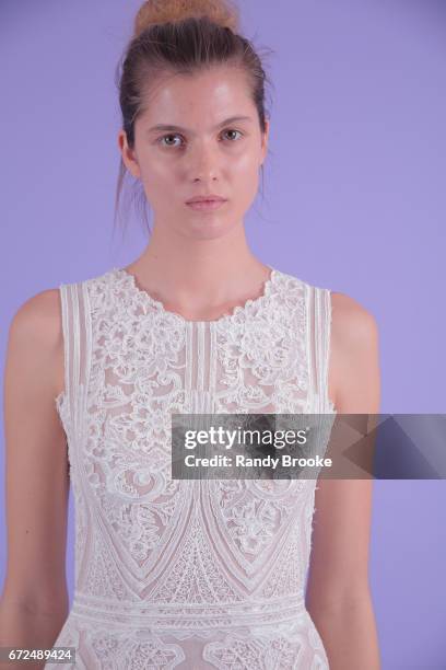 Model poses on seamless paper at the Isabelle Armstrong Spring 2018 bridal presentation during New York Fashion Week: Bridal April 2017 at The London...