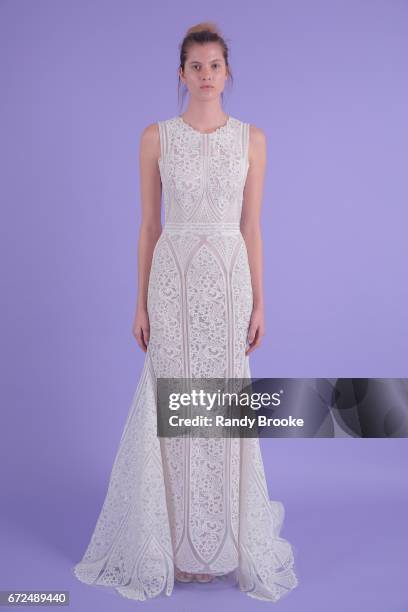 Model poses on seamless paper at the Isabelle Armstrong Spring 2018 bridal presentation during New York Fashion Week: Bridal April 2017 at The London...