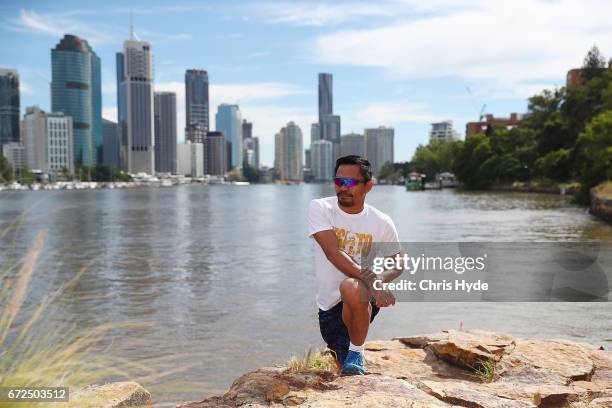 Manny Pacquiao stretches during a visit to Kangaroo Point. Pacquiao is in Australia to promote his upcoming fight with Australian Jeff Horn on April...