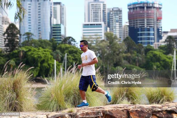 Manny Pacquiao runs during a visit to Kangaroo Point. Pacquiao is in Australia to promote his upcoming fight with Australian Jeff Horn on April 25,...