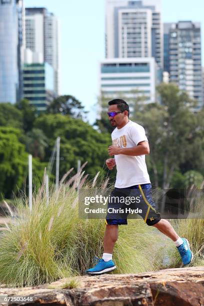 Manny Pacquiao runs during a visit to Kangaroo Point. Pacquiao is in Australia to promote his upcoming fight with Australian Jeff Horn on April 25,...
